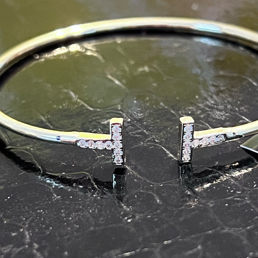 Elegant Anthropologie Gold-plated Bangle with Crystal Accents